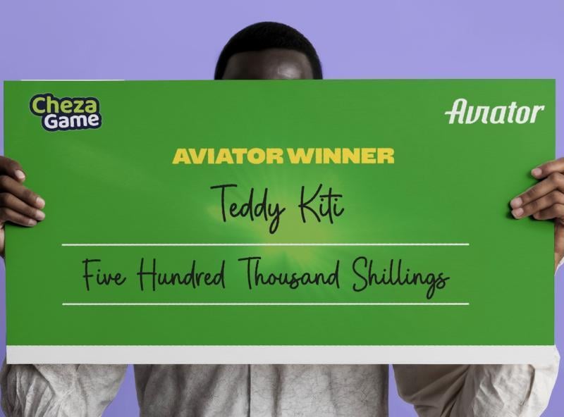 Aviator winner hides face as he receives KSH500,000 Cheque from Chezagame